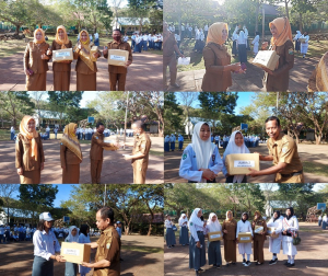 Kepala SMAN 3 Baubau serahkan Hadiah Lomba Gebyar HUT RI ke-77 yang diselenggarakan SMAN 3 Baubau 